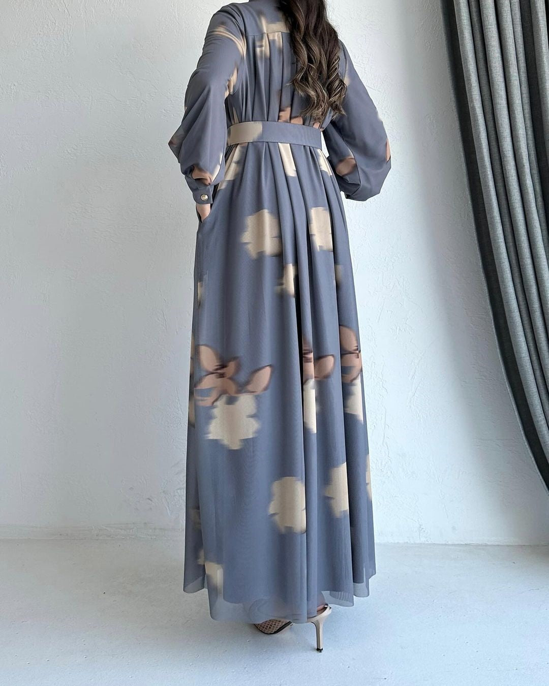 Elegant Grey Pleated Maxi Dress with Floral Print, Belted Waist & Side Pockets